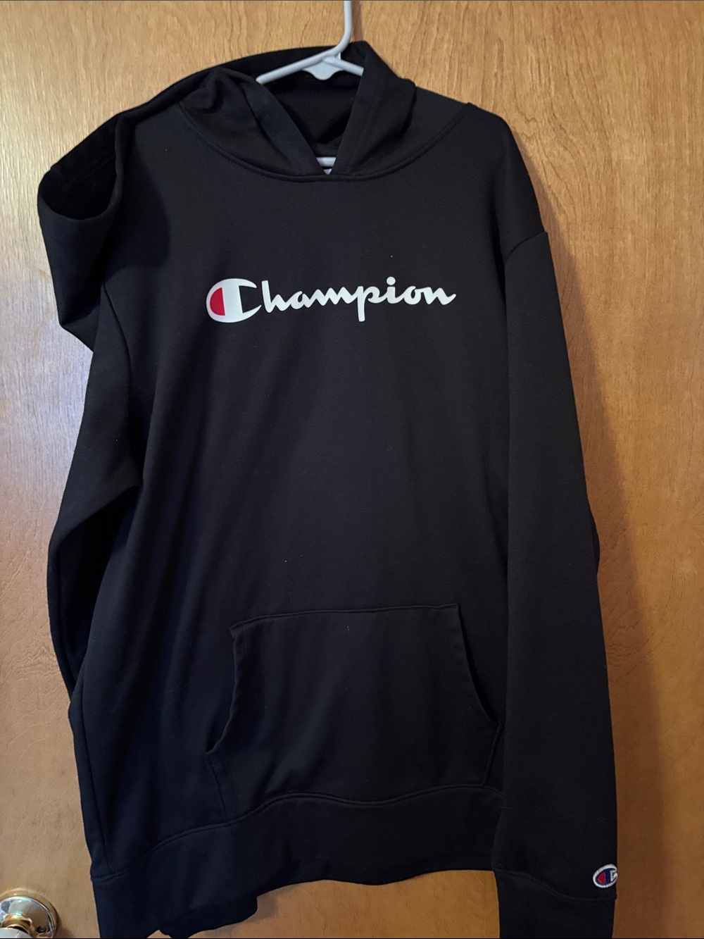 Champion Black Pullover Hoodie with White Script and Red Emblem